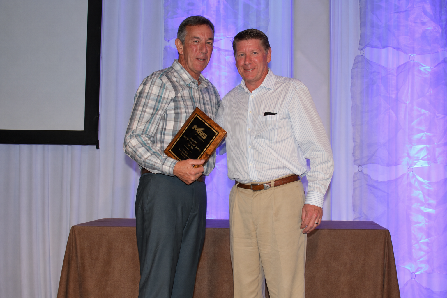James Ray and Peter Ray accepting the MSS Contractor of the Year award