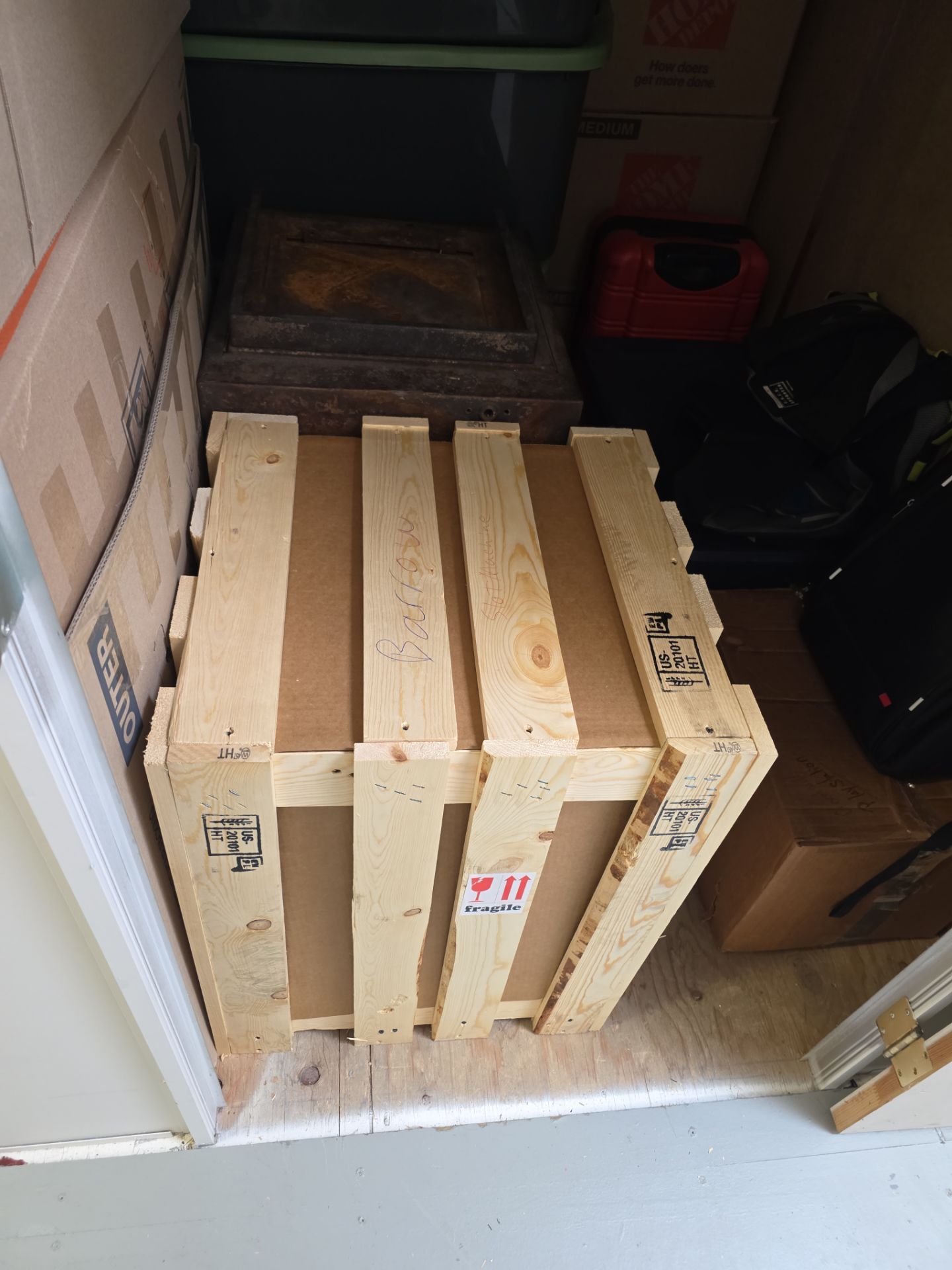 Vintage slot machine protected inside a custom wood crate